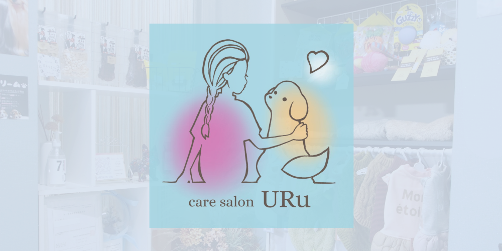 人と犬が寄り添ったロゴ